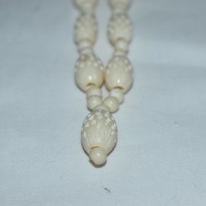 Cream Colored Plastic Beaded Necklace